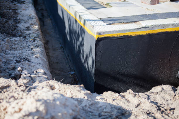 Professional Emergency Waterproofing technician working in Brighton, TN